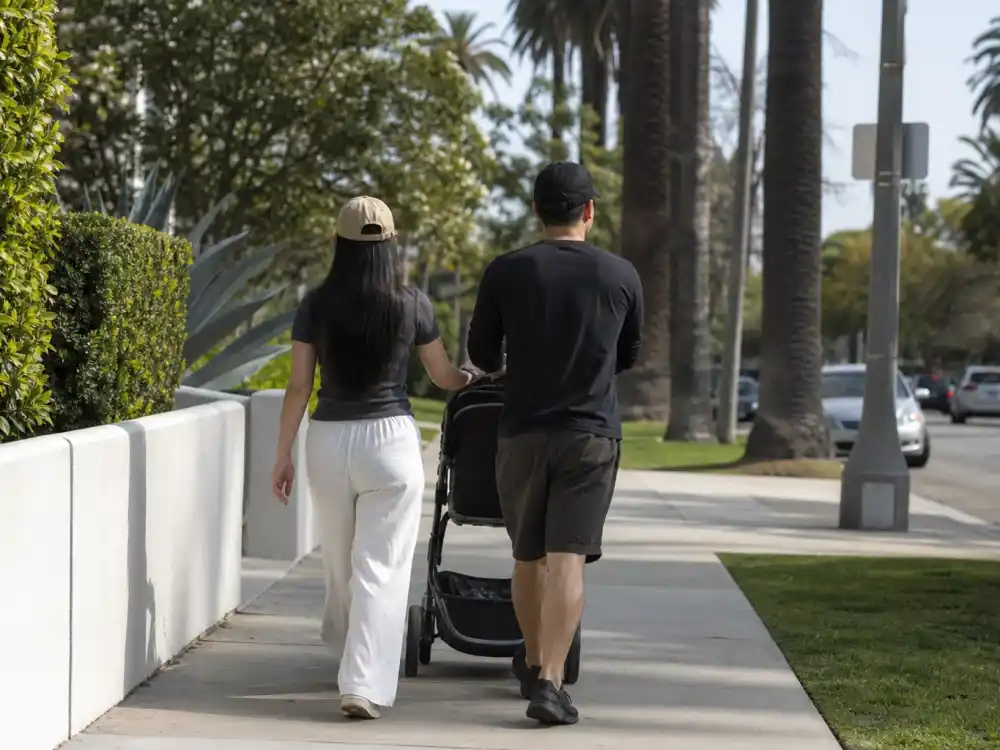 Suburban stroller silhouettes for where is Brenda Song now raising two sons with Macaulay Culkin in 2026