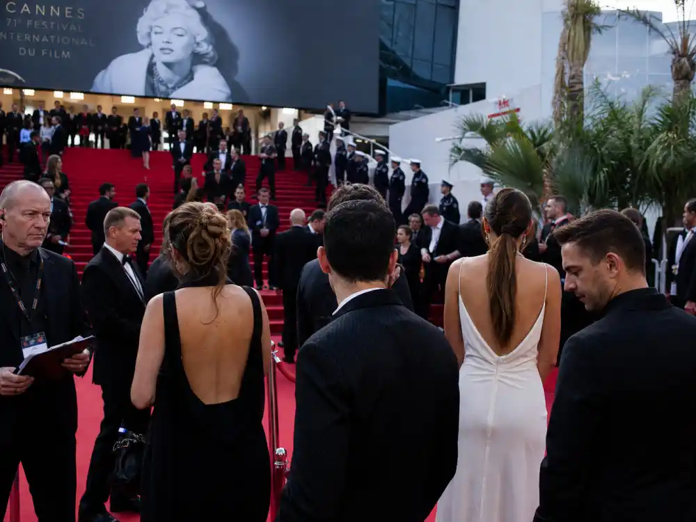 Festival security and velvet ropes at Cannes red carpet rules and dress code checkpoint before guests climb the Palais steps