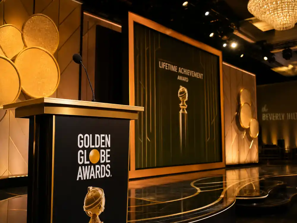Awards ceremony podium where Cecil B DeMille Award winners list recipients deliver landmark acceptance speeches each January