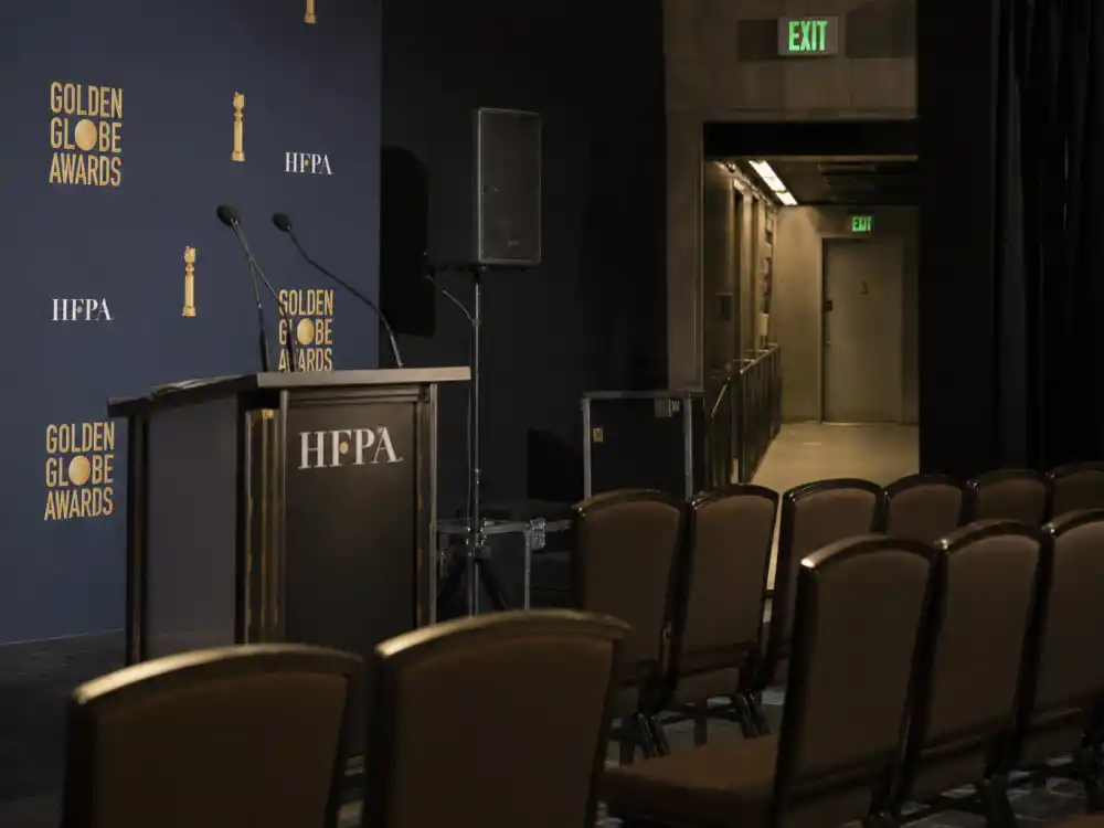 Empty awards press room with turned-off microphones represents backstage silence when celebrities who boycotted award shows refused to lend star power to ceremonies