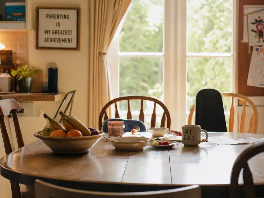Family kitchen morning light representing celebrities who quit Hollywood to prioritize parenting and home life
