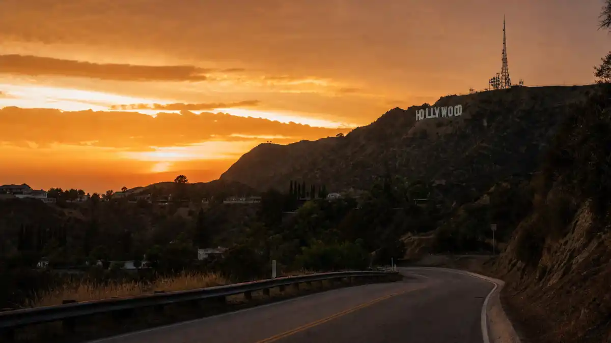 Celebrities who quit Hollywood — Hollywood sign at dusk evoking stars who walked away from Tinseltown fame