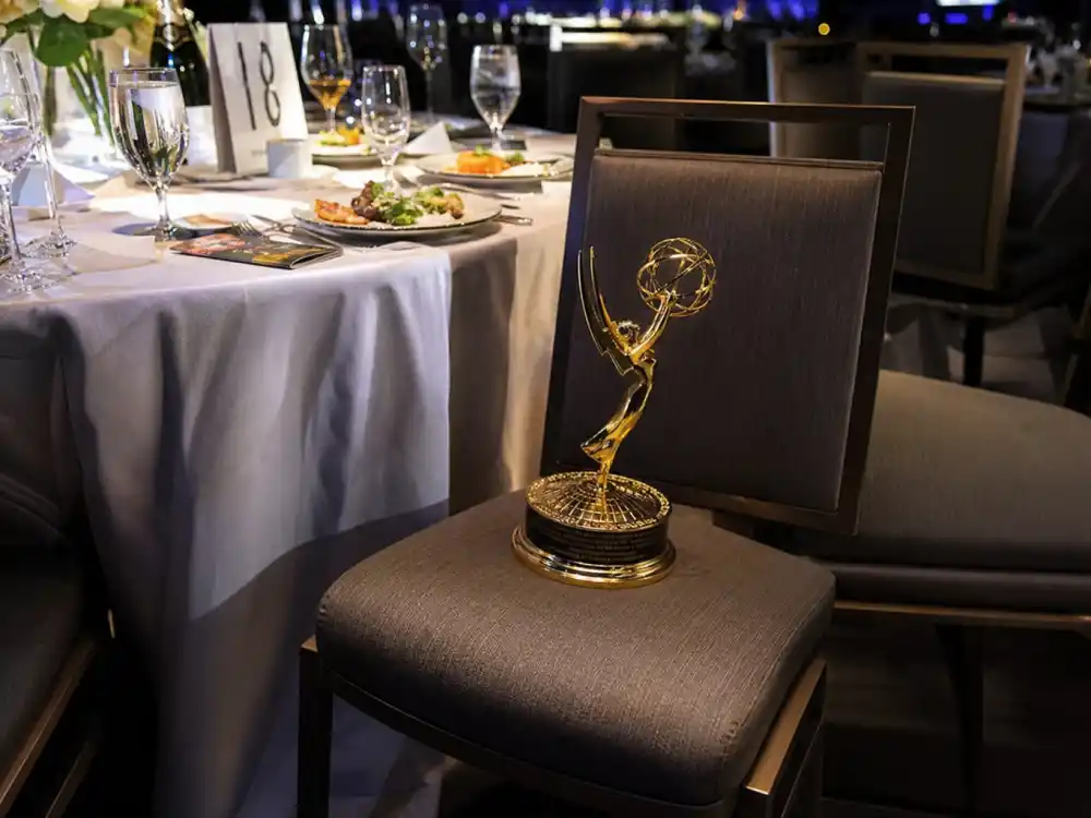 Golden trophy on an empty banquet chair symbolizes George C. Scott and other celebrities who skipped accepting their awards after winning competitive categories
