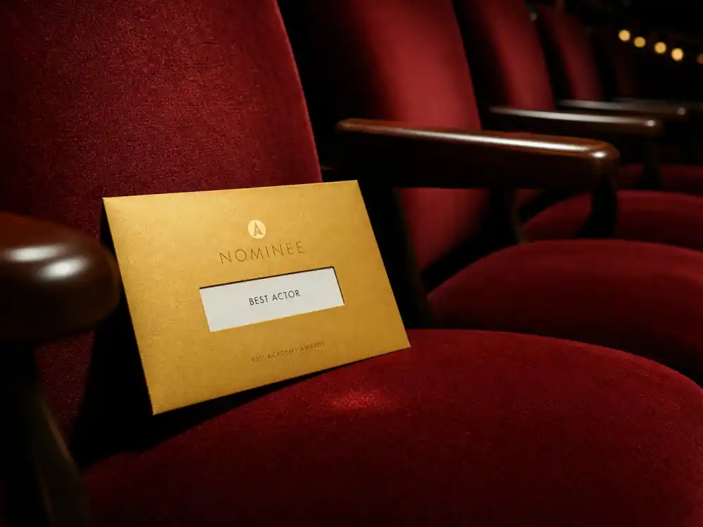 Unopened awards envelope on a vacant theater seat documents how celebrities who skipped accepting their awards sometimes miss envelope night entirely