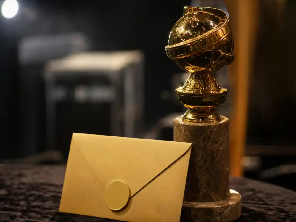 Golden awards trophy beside an empty nomination envelope captures the heartbreak behind celebrity award show snubs controversial enough to dominate headlines for decades
