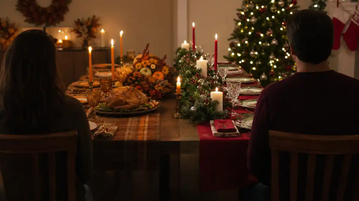 Celebrity co-parenting holiday traditions split Thanksgiving and Christmas table silhouettes from behind without identifiable faces