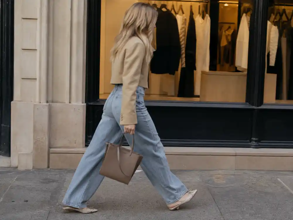 Wide-leg high-waist denim pants with cropped blazer central to celebrity denim street style looks proportion math
