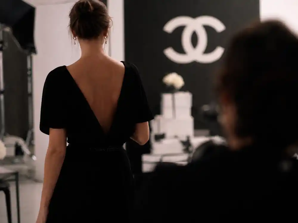 Luxury fashion campaign photoshoot from behind for celebrity kids turned models list 2026 Lily-Rose Depp Chanel editorial lane without identifiable faces