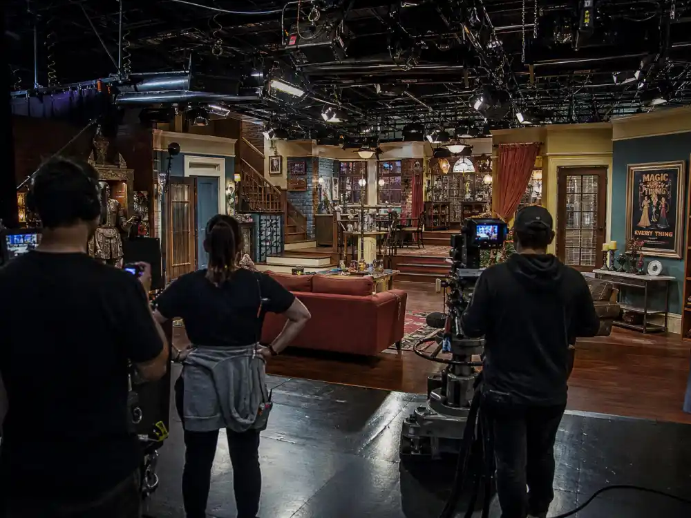 Wizards of Waverly Place style sitcom set from behind for celebrity kids who started on Disney Channel family comedy editorial without identifiable faces