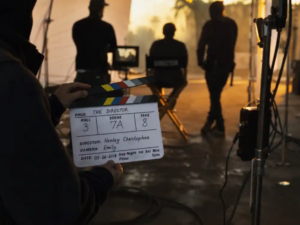 Indie film set clapperboard for celebrity offspring breaking into Hollywood 2026 Dakota Johnson franchise acting lane editorial without identifiable faces