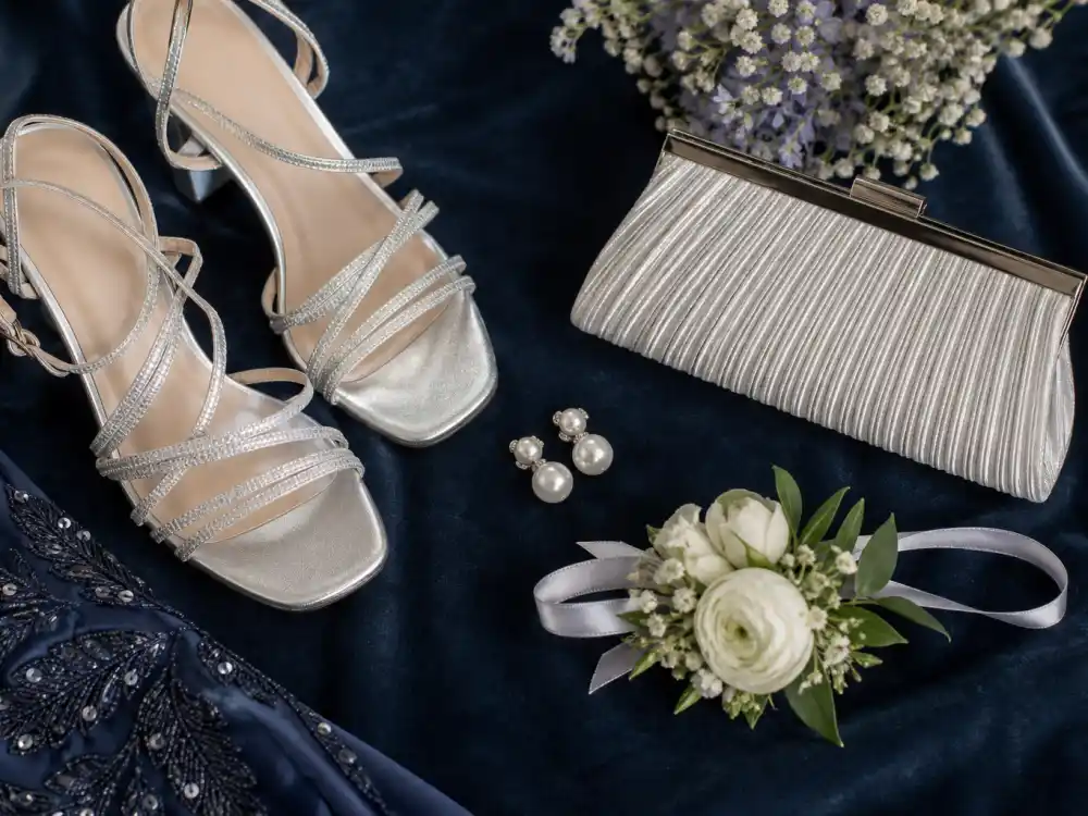 Prom heels pearl earrings corsage and clutch flat lay completing celebrity prom dress inspiration accessory styling