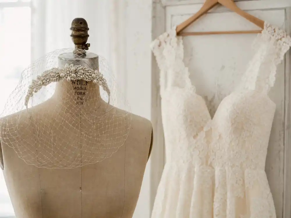 Juliet cap veil and pearl headpiece paired with lace gown defining celebrity vintage wedding dress inspiration accessory vocabulary