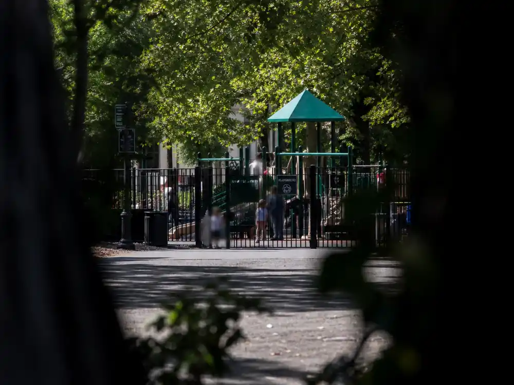 Playground privacy distance for Chris Martin Gwyneth Paltrow co-parenting Apple Moses minors gate editorial without identifiable faces