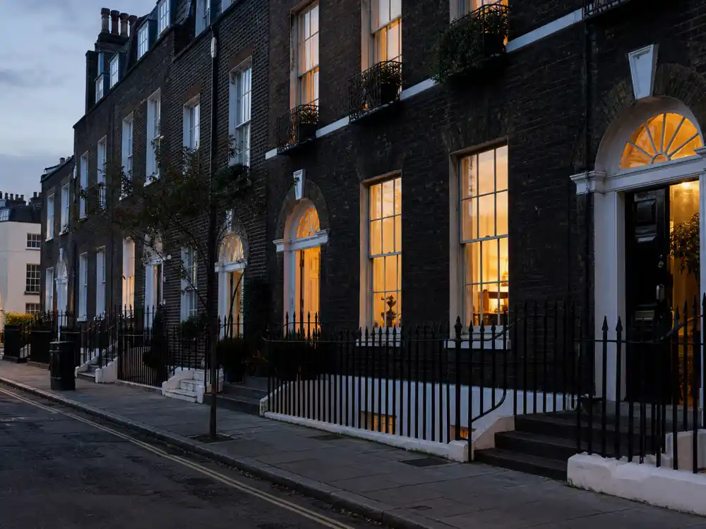 Elegant London townhouse street at dusk for where Claudia Schiffer lives now with her family