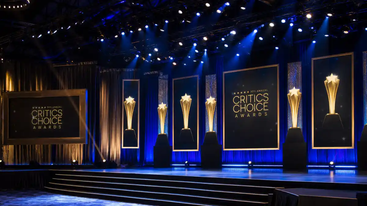 Critics Choice Awards 2026 winners — Barker Hangar ceremony stage where One Battle After Another, The Pitt, and The Studio claimed top honors