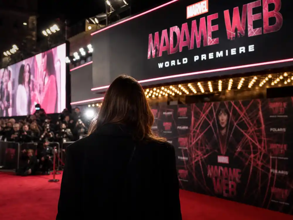 Madame Web superhero premiere from behind for Dakota Johnson celebrity kid acting career Marvel franchise editorial without identifiable faces