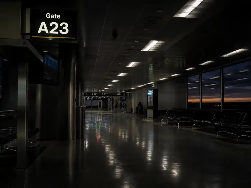 An empty airport departure gate at dusk representing Devon Sawa Final Destination horror breakthrough
