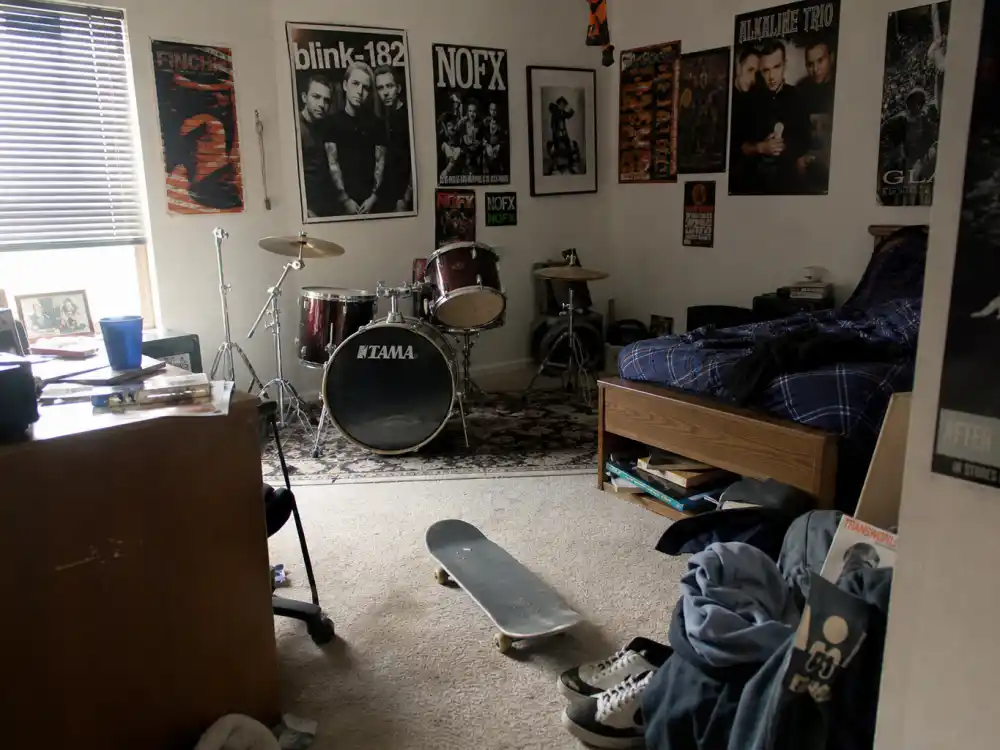 2000s teen bedroom with drum set evoking Drake and Josh cast where are they now Nickelodeon nostalgia