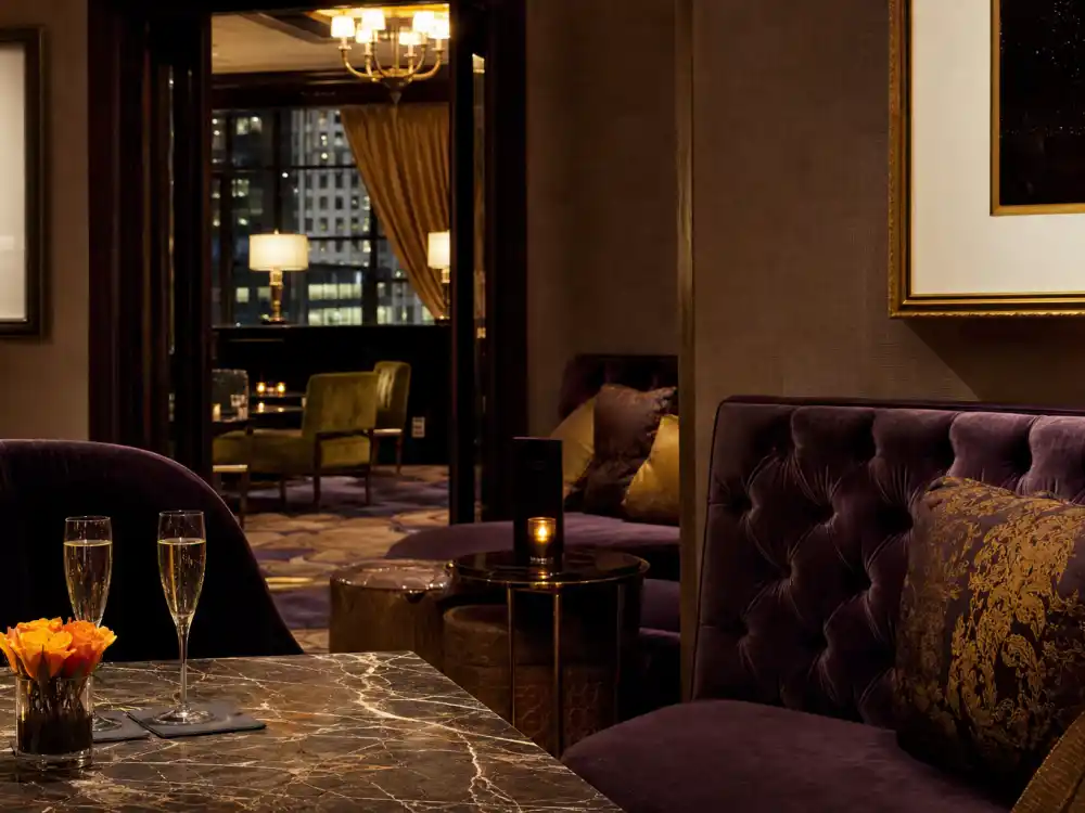 Upscale Manhattan hotel lounge for what happened to Ed Westwick as Chuck Bass on Gossip Girl 2007–2012