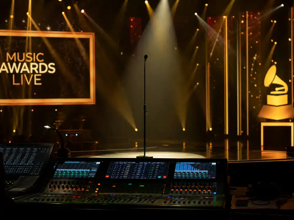 Grammy-style concert stage with generic trophy symbolizing music awards on the EGOT winners complete list