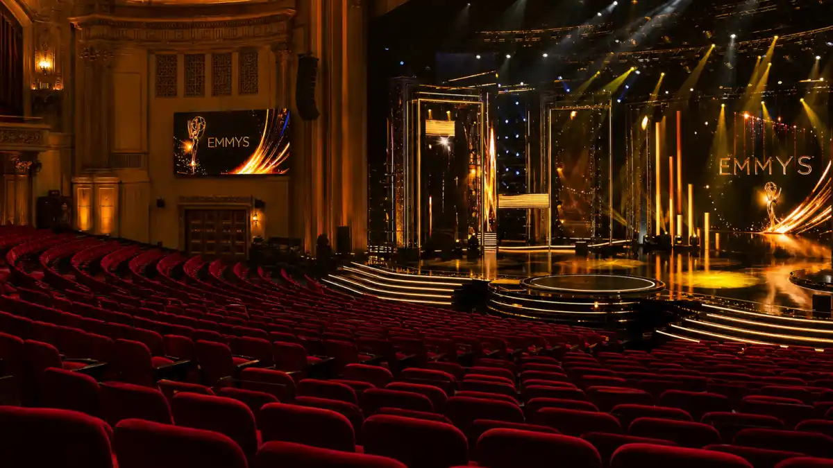 Emmy winners 2026 full list — dramatic television awards theatre stage with golden spotlights before the September 14 NBC ceremony