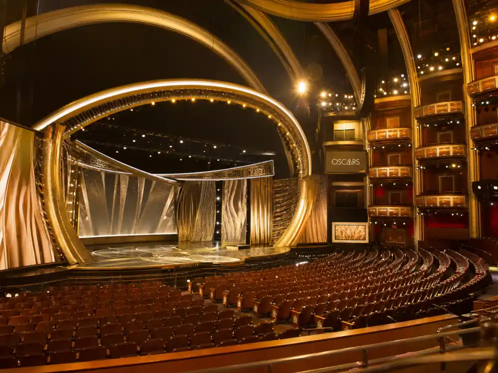 Modern awards auditorium interior reflecting how first Black Oscar winners in history expanded into contemporary Academy categories