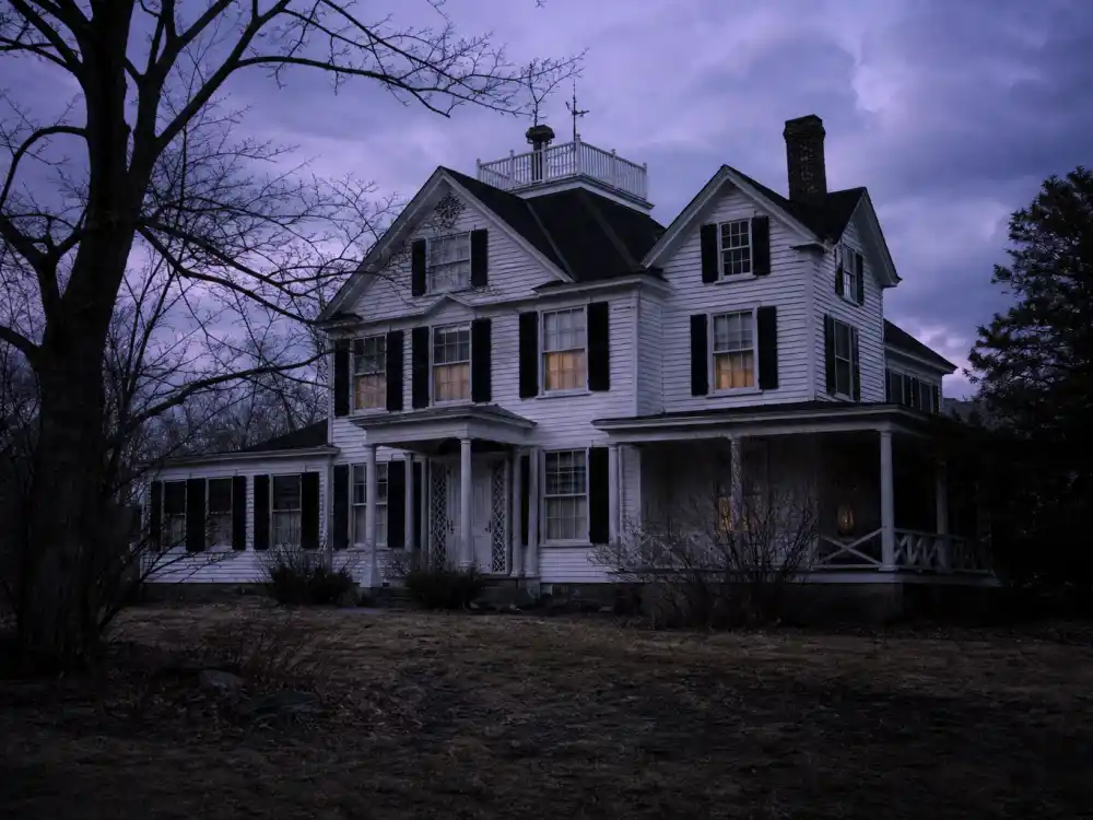 A gothic New England colonial house at twilight evoking Geena Davis Beetlejuice and 1980s comedy-horror breakthrough