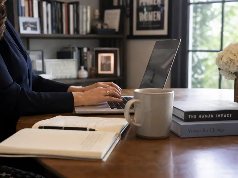 A refined home office with laptop for where Geena Davis is now in 2026 — institute work and selective projects