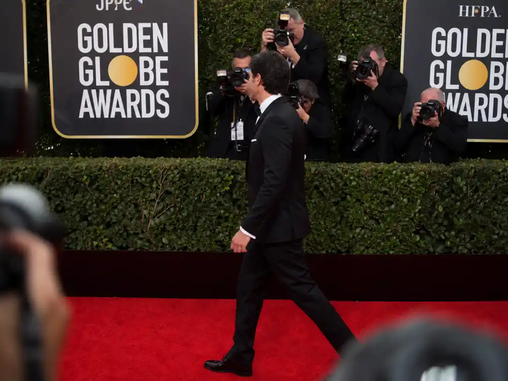 Classic black-tie menswear on the Golden Globes best dressed of all time list — tuxedo arrivals that matched gown-level headline velocity