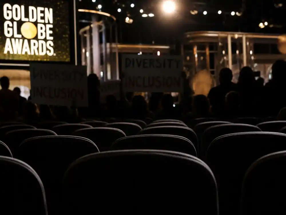 Empty theater seats and diversity protest signs reflect Golden Globes biggest controversies history over all-white HFPA membership criticism