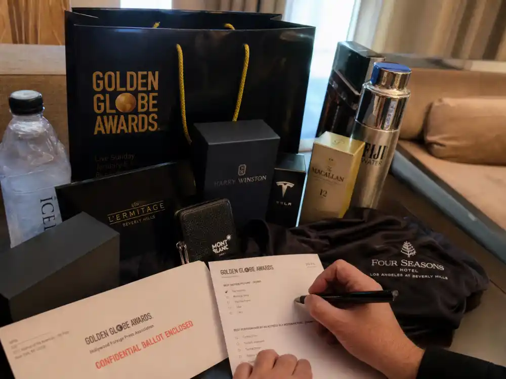 Luxury gift bags beside ballot envelopes fuel payola allegations central to Golden Globes biggest controversies history for decades