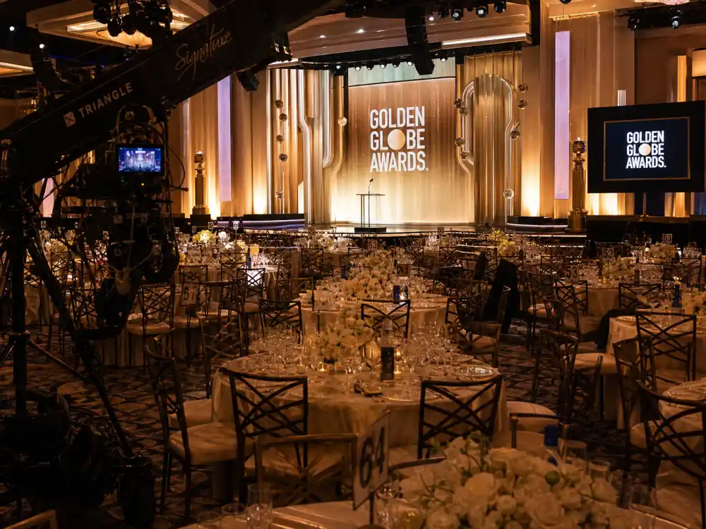 Beverly Hilton ballroom prepared for nights when the best Golden Globes host monologues ever command a global NBC audience