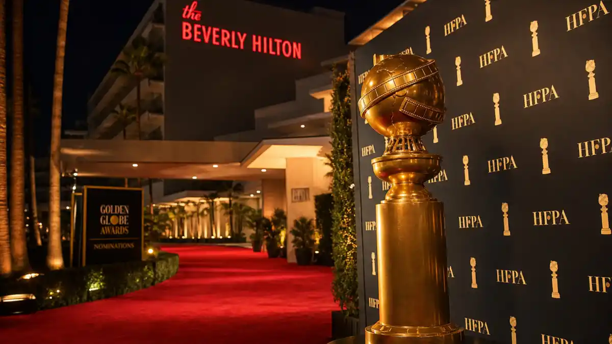Golden Globes nominations 2026 list — Beverly Hilton red carpet press wall with golden globe statuette at 83rd nominations announcement