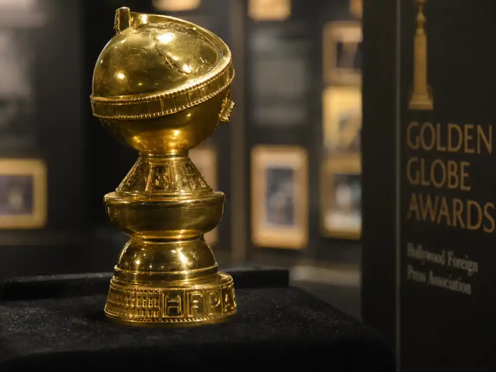 Golden Globe statuette with film-strip base symbolizing every champion on the Golden Globes winners list all time