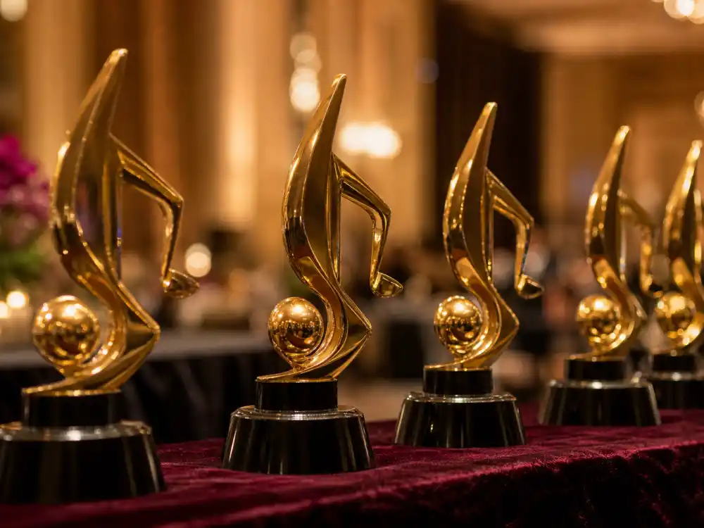 Generic golden music trophies on display illustrate the Lifetime Achievement consolation pattern for famous artists who never won a Grammy competitively