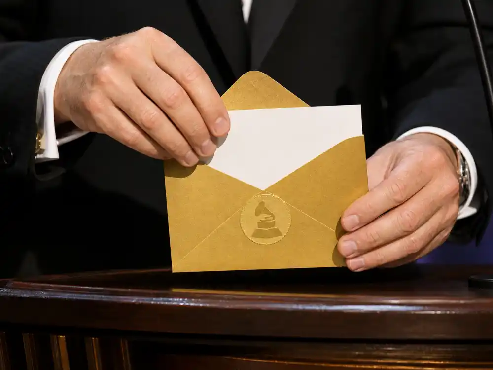 Golden nominations envelope being opened at the Grammy nominations 2026 reveal before the February 1 ceremony