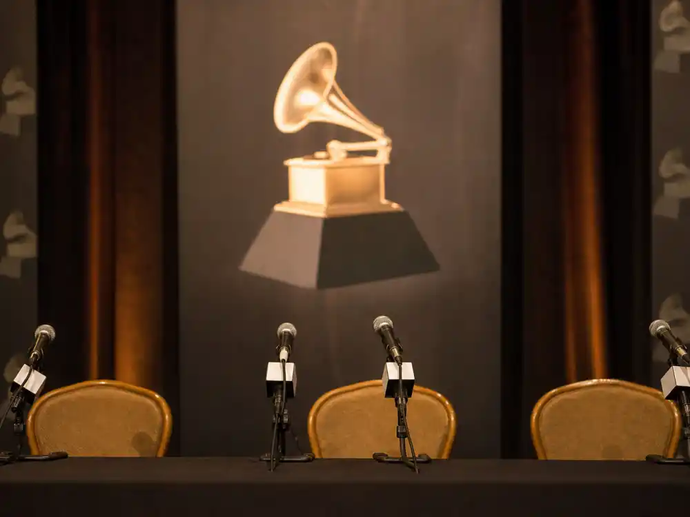 Press conference podium with microphones at the Grammy nominations 2026 announcement event in November 2025