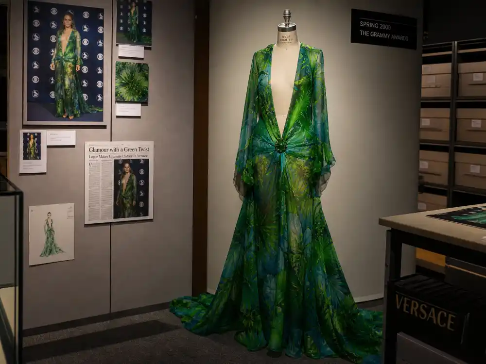 Tropical print green silk chiffon Grammy evening gown evoking Jennifer Lopez 2000 Versace look in Grammys best dressed of all time rankings