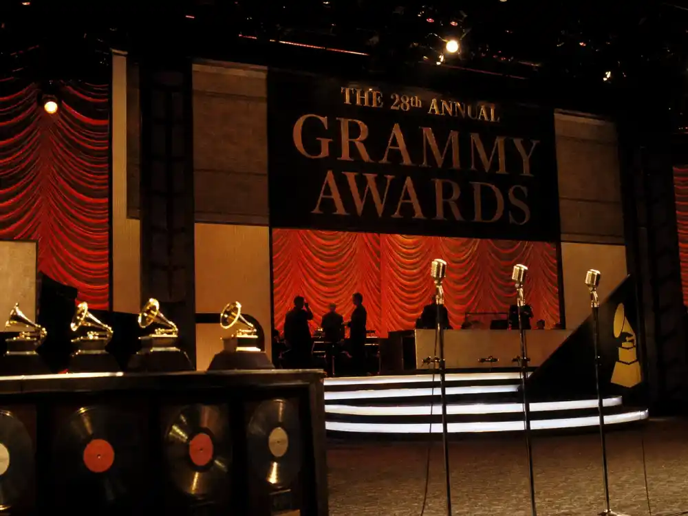 Vintage awards stage with vinyl records evokes classic-era entries on lists of Grammys most shocking moments history from the 1980s and 1990s