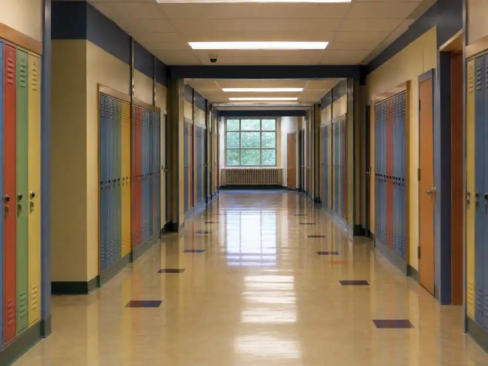 Colorful middle school hallway lockers evoking Hilary Duff Lizzie McGuire Disney Channel era fame