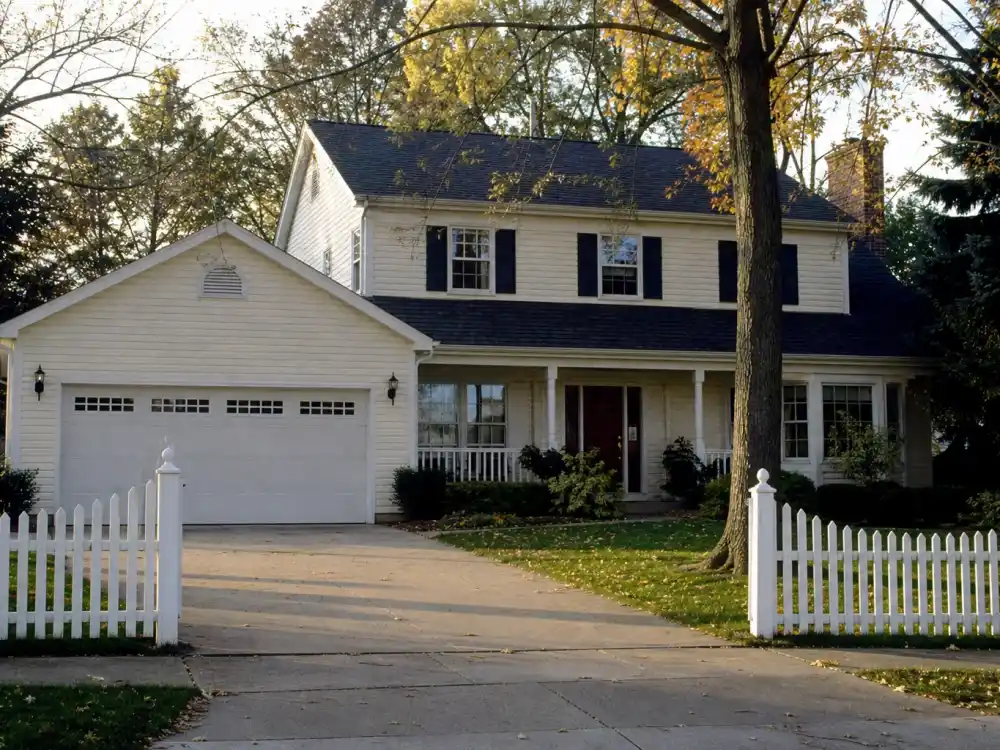Classic 1990s suburban Michigan home exterior evoking the Home Improvement cast where are they now Taylor family house