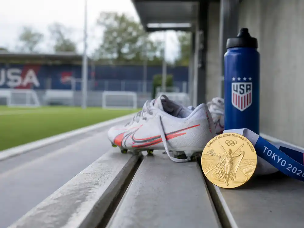 Olympic gold medal on soccer bench for where is Hope Solo now London 2012 glory