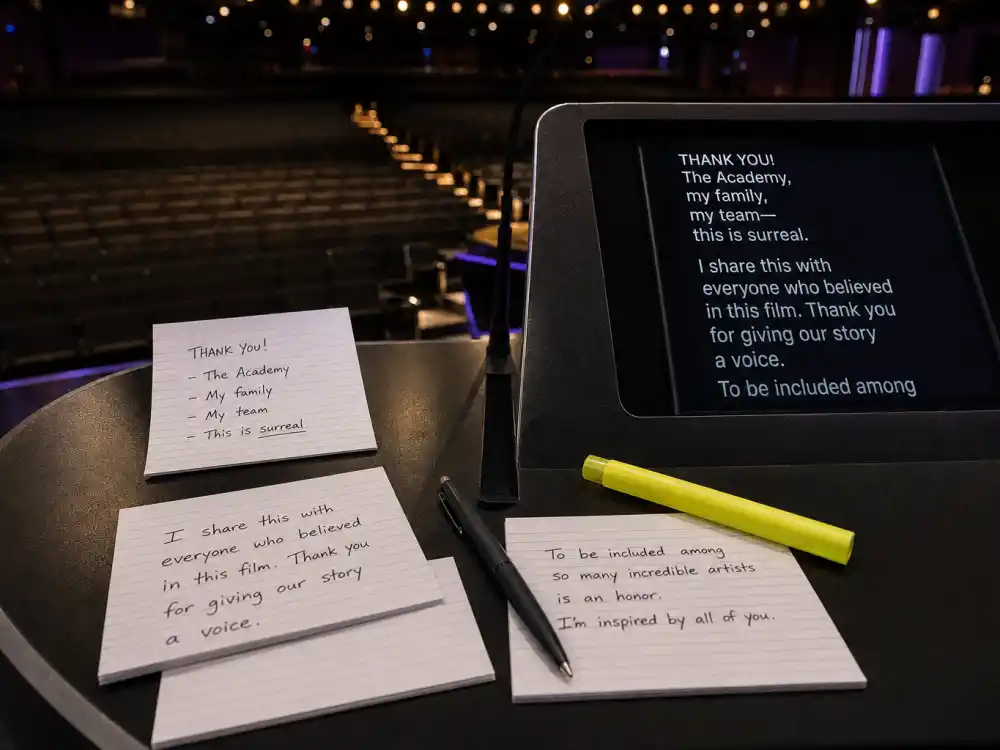 Acceptance speech notecards and teleprompter script on podium desk for how do celebrities prepare for award shows winner remarks