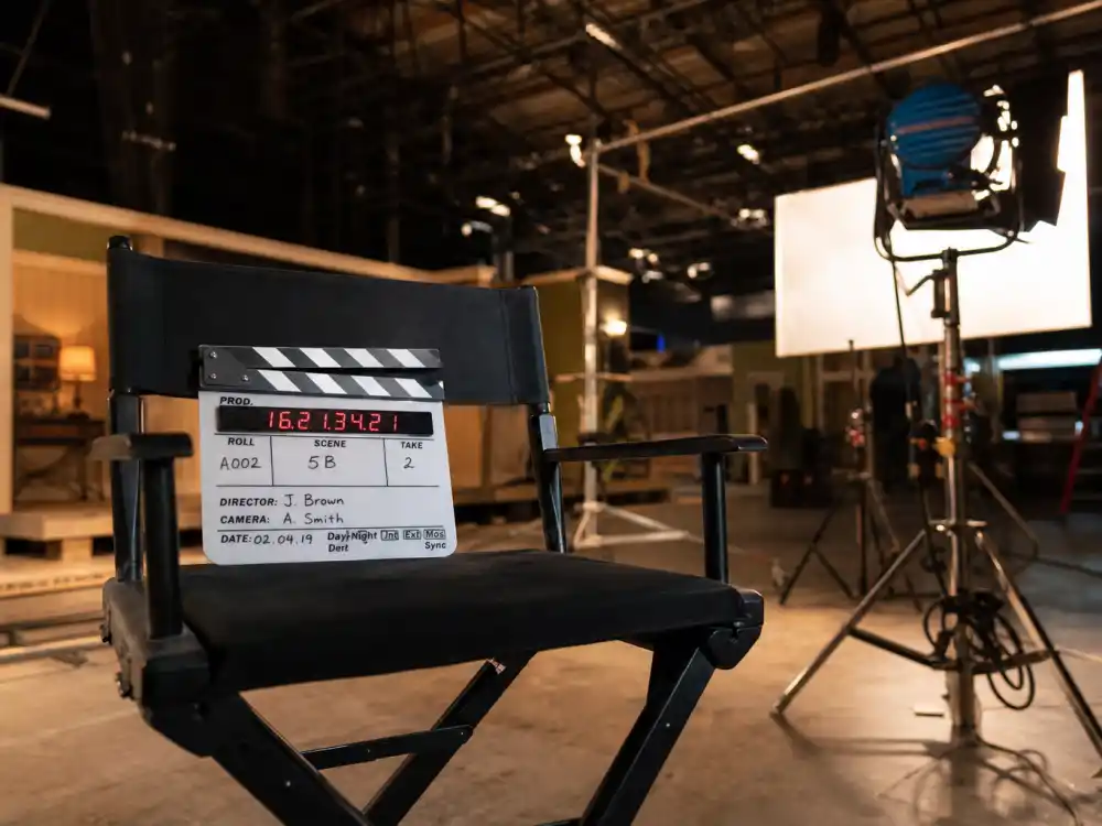 Film studio set reflecting how old is Angelina Jolie career arc from 1990s indie breakout to Oscar-winning drama and blockbuster franchise superstardom