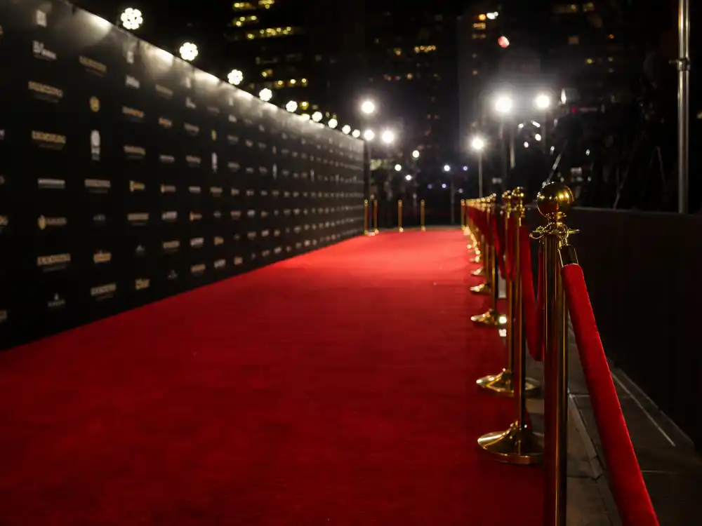 Red carpet premiere display reflecting how old is Anne Hathaway at industry peak — Oscar milestones and blockbuster breakthroughs across three decades