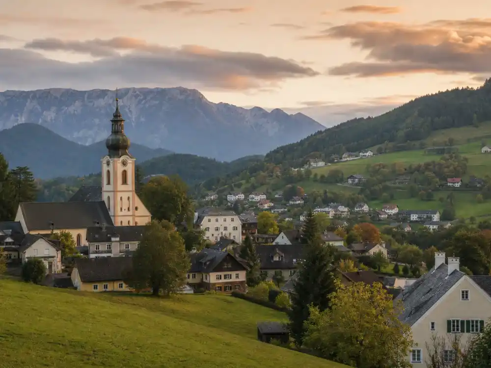 Austrian alpine village near Graz evoking how old is Arnold Schwarzenegger birthplace — Thal where Arnold Alois Schwarzenegger was born on July 30, 1947