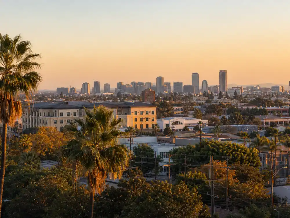 Anaheim California skyline evoking how old is Austin Butler birthplace — the Orange County city where Austin Robert Butler was born on August 17, 1991