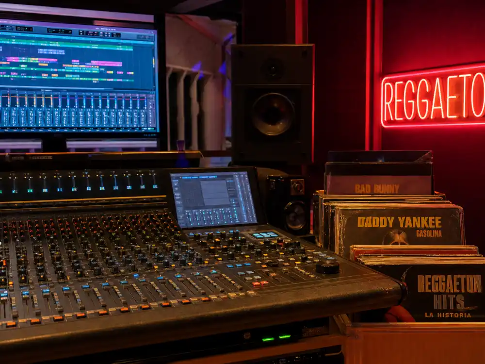Reggaeton studio mixing desk for how old is Bad Bunny career milestone editorial without identifiable faces