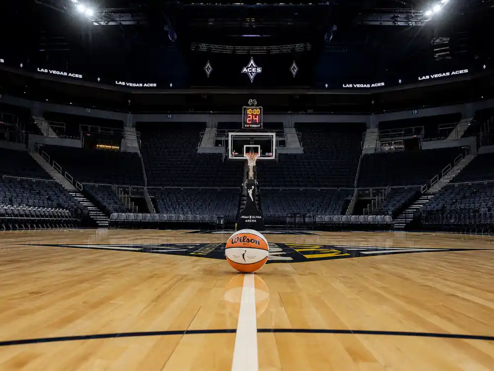 Basketball court reflecting how old is Caitlin Clark career arc from Iowa youth programs to NCAA record-breaker and WNBA rookie sensation