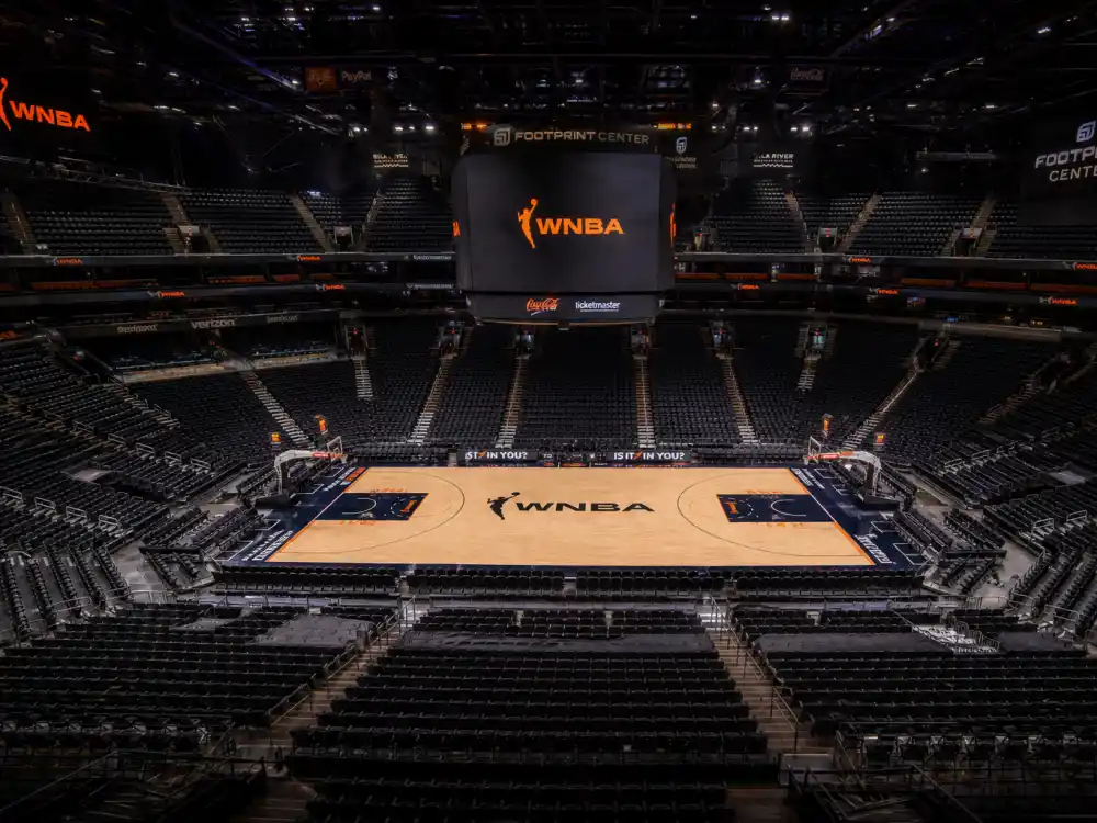 WNBA arena interior reflecting how old is Caitlin Clark at industry peak — Iowa Hawkeyes dominance and Indiana Fever debut before age twenty-five